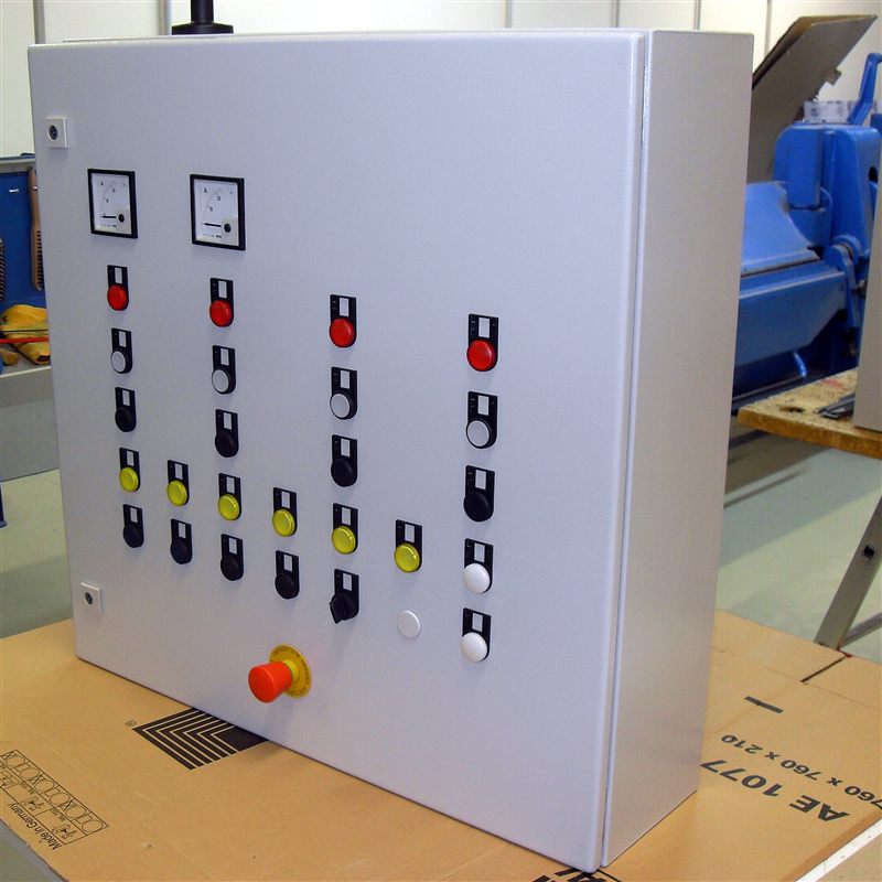 Industrial operator control station with pushbuttons and selector switches, the type of machine station where Schmersal AZM200 interlocks protect access points
